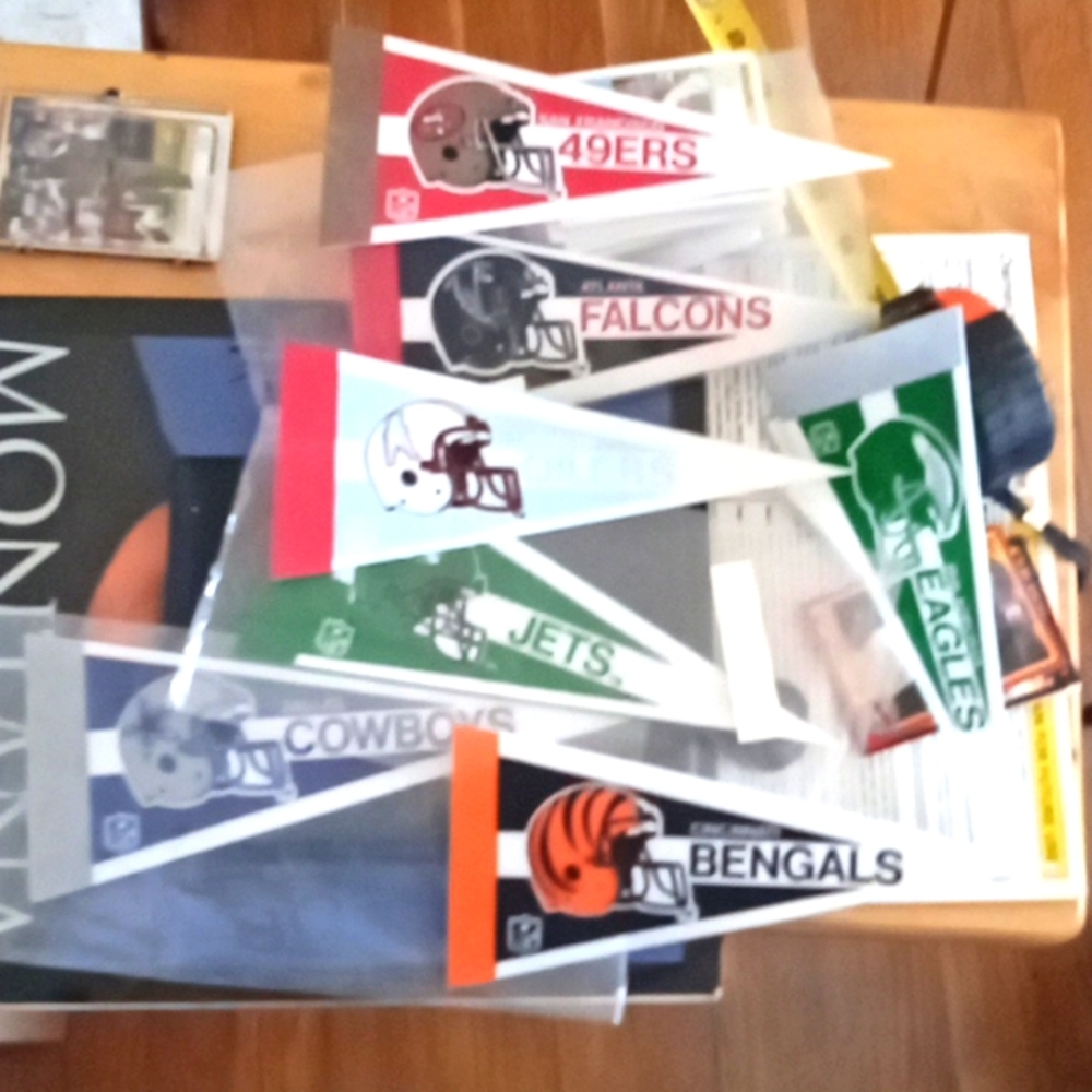 7 Vintage 9" NFL team flags from 1990.